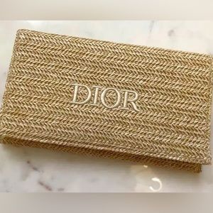 Dior straw summer cosmetic bag, makeup bag.